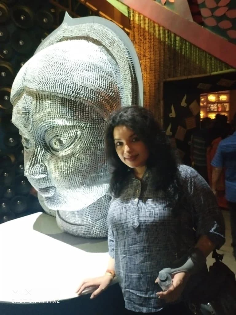 Durga Puja pandal idol for visually impaired visitors tactile metallic sculpture Kolkata
