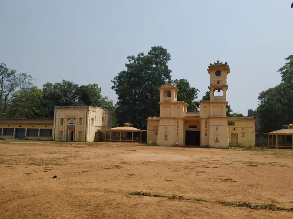 Singha Sadan historic landmark with clock tower and bell tower at Visva-Bharati University