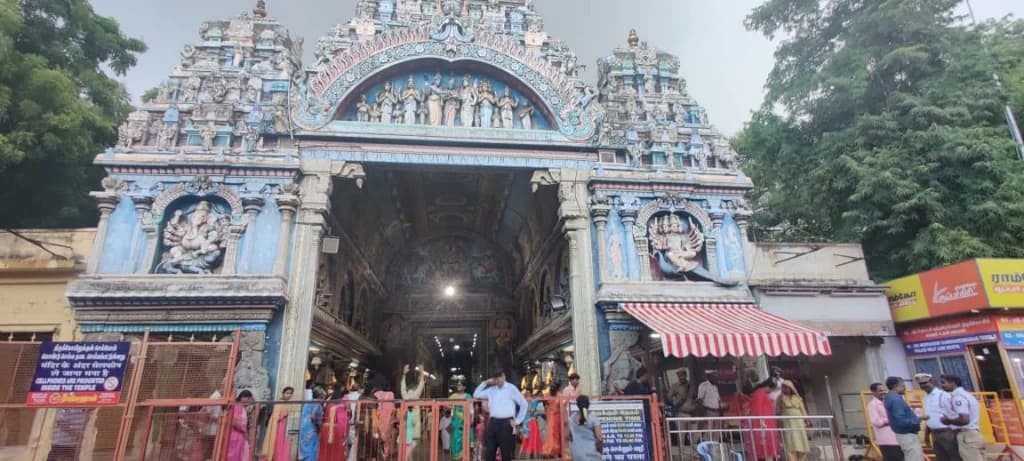 Vibrant blue Dravidian gopuram and gateway of Meenakshi Amman Temple