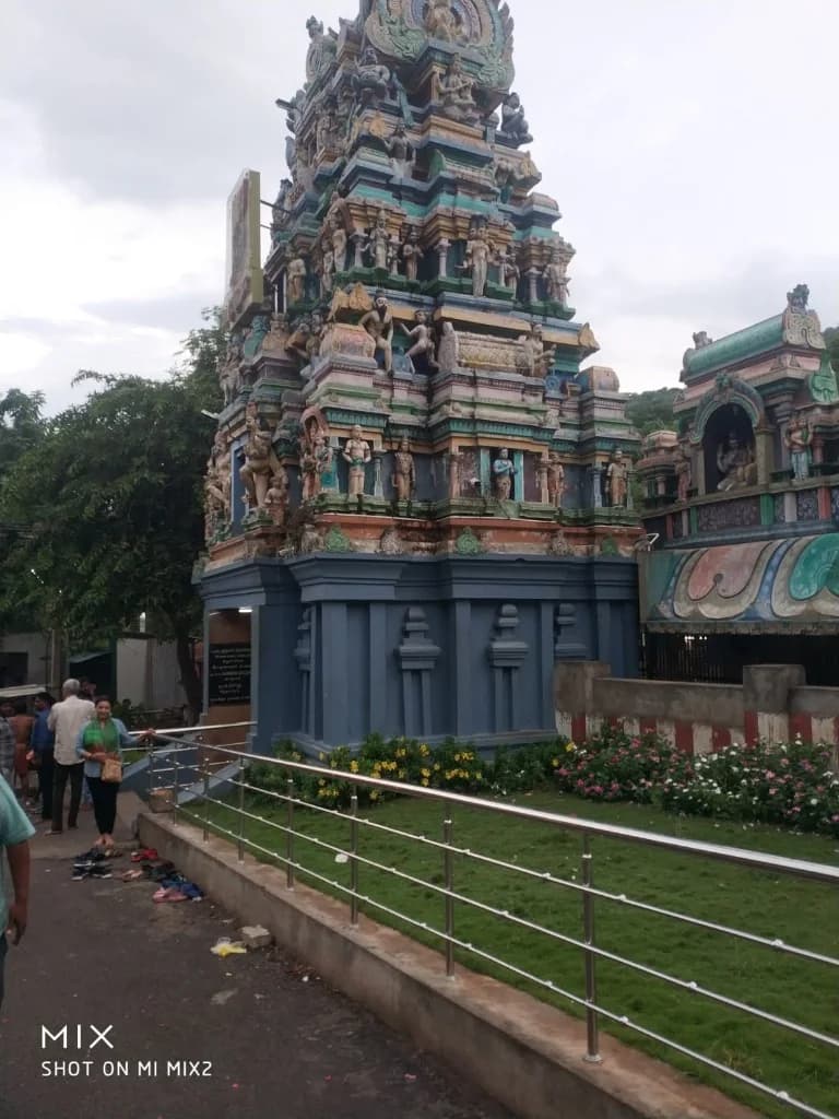 Sculpted blue gopuram shrine at Thirupparankundram Murugan Temple
