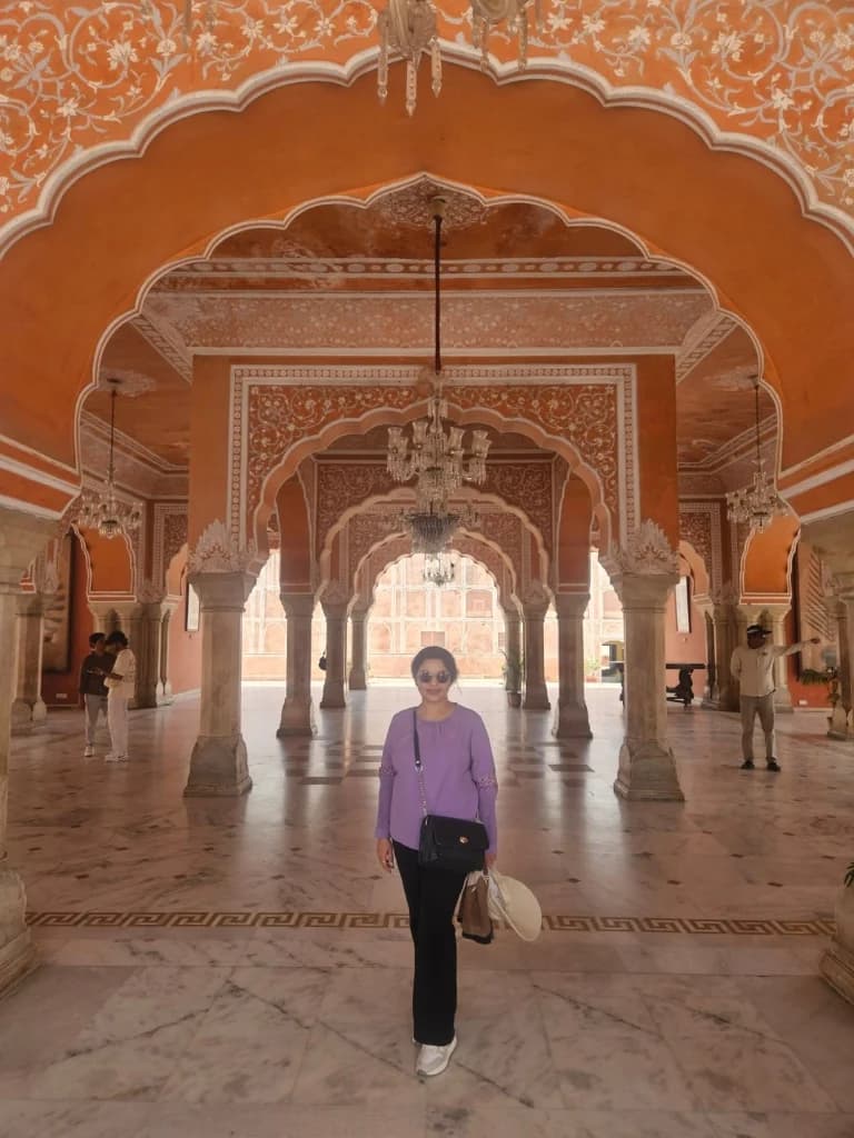 Arched corridor within Jaipur's City Palace