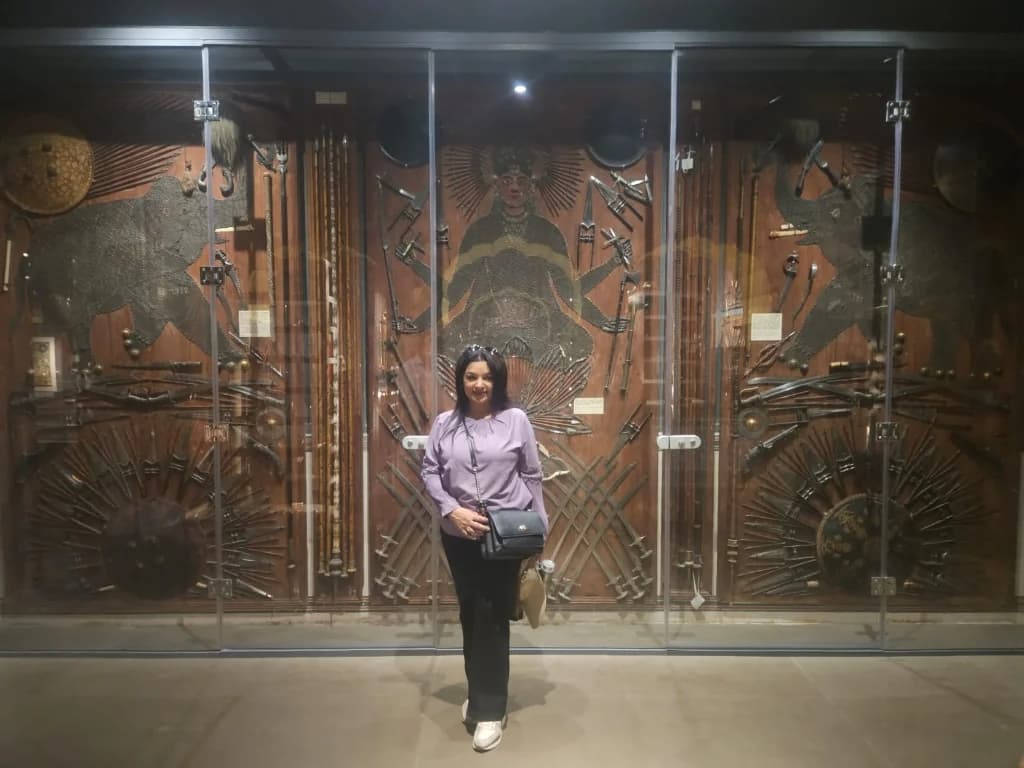 Ornate doorway within the City Palace museum, featuring the Peacock Gate
