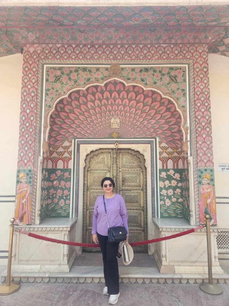 Intricately painted doorway inside Jaipur's City Palace