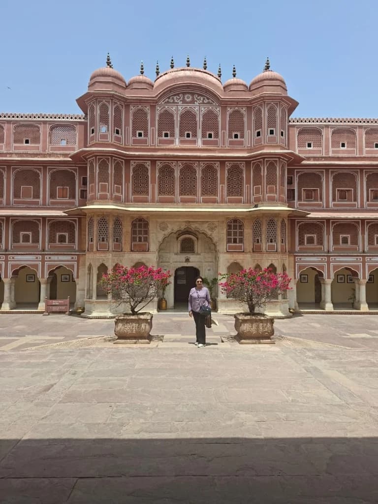 Pink-hued courtyard within Jaipur's City Palace