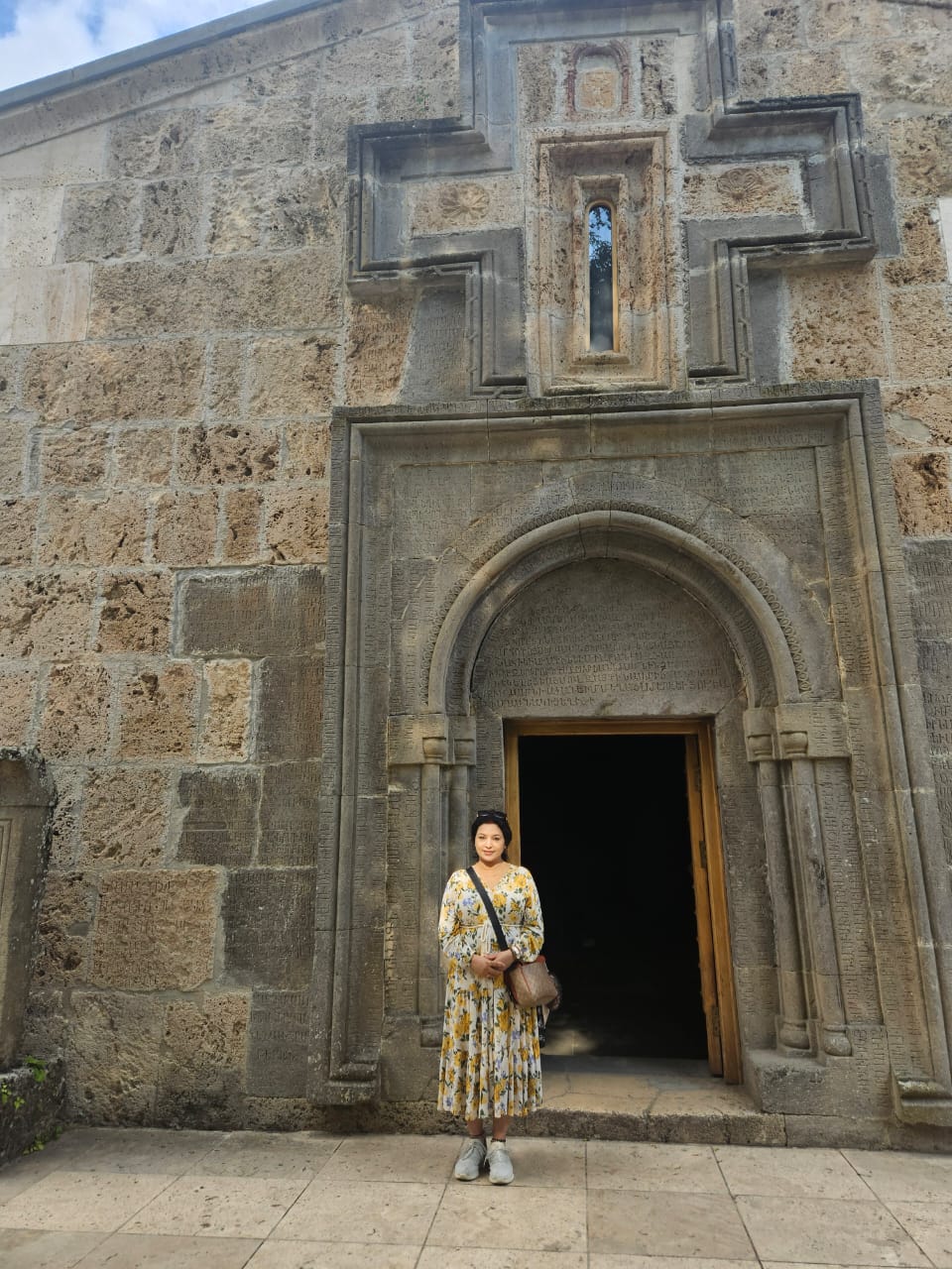 Intricate carvings on stone walls inside Haghartsin churches