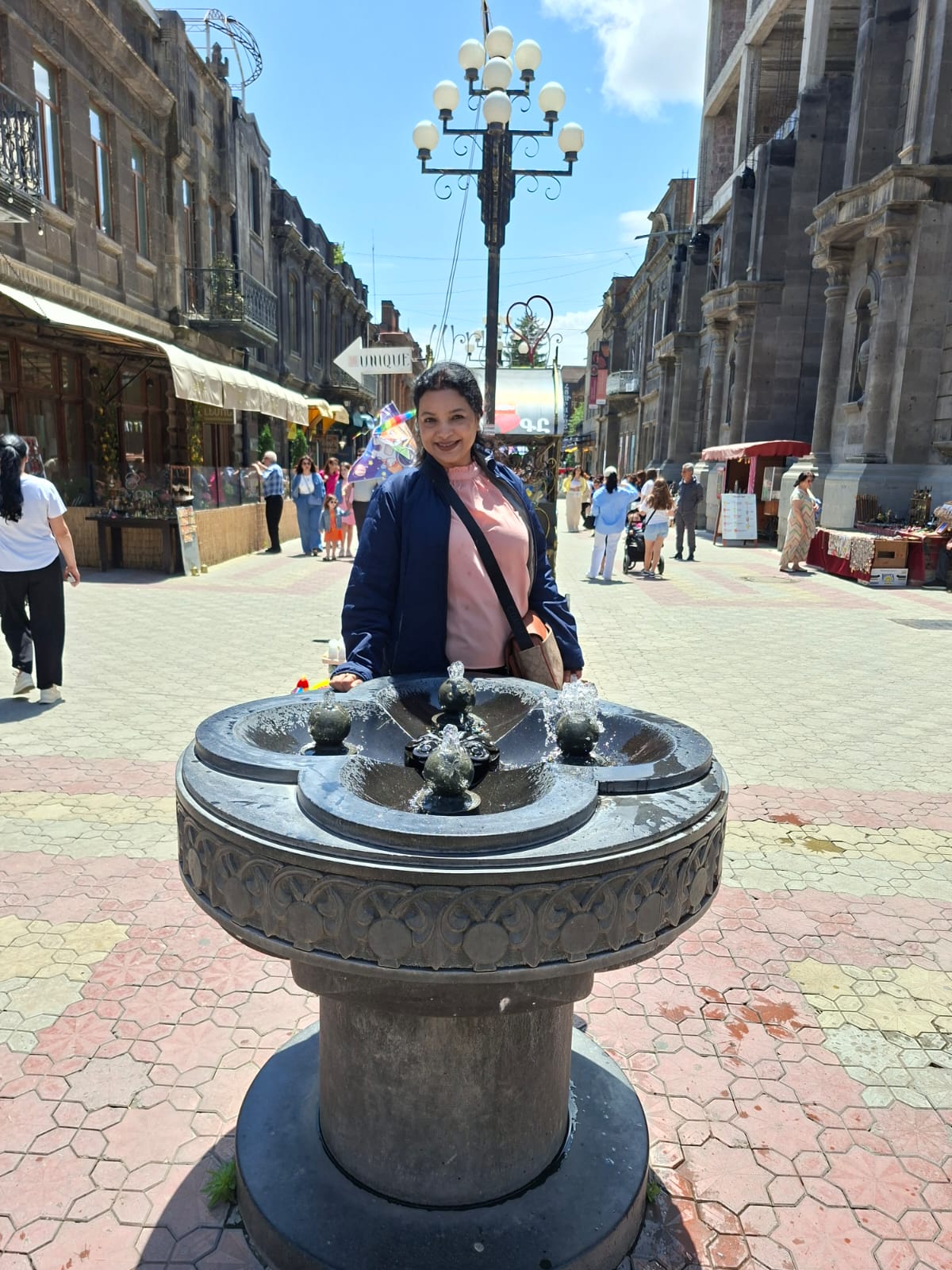 A statue or historic landmark inside a square in Gyumri