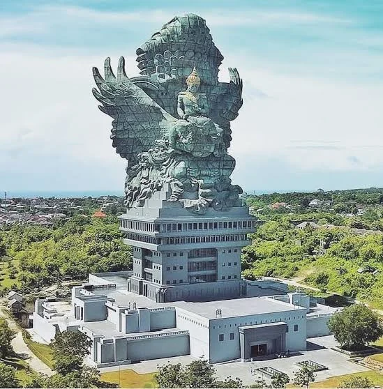 Aerial overview of the complete 121-meter Garuda Wisnu Kencana statue on its pedestal building