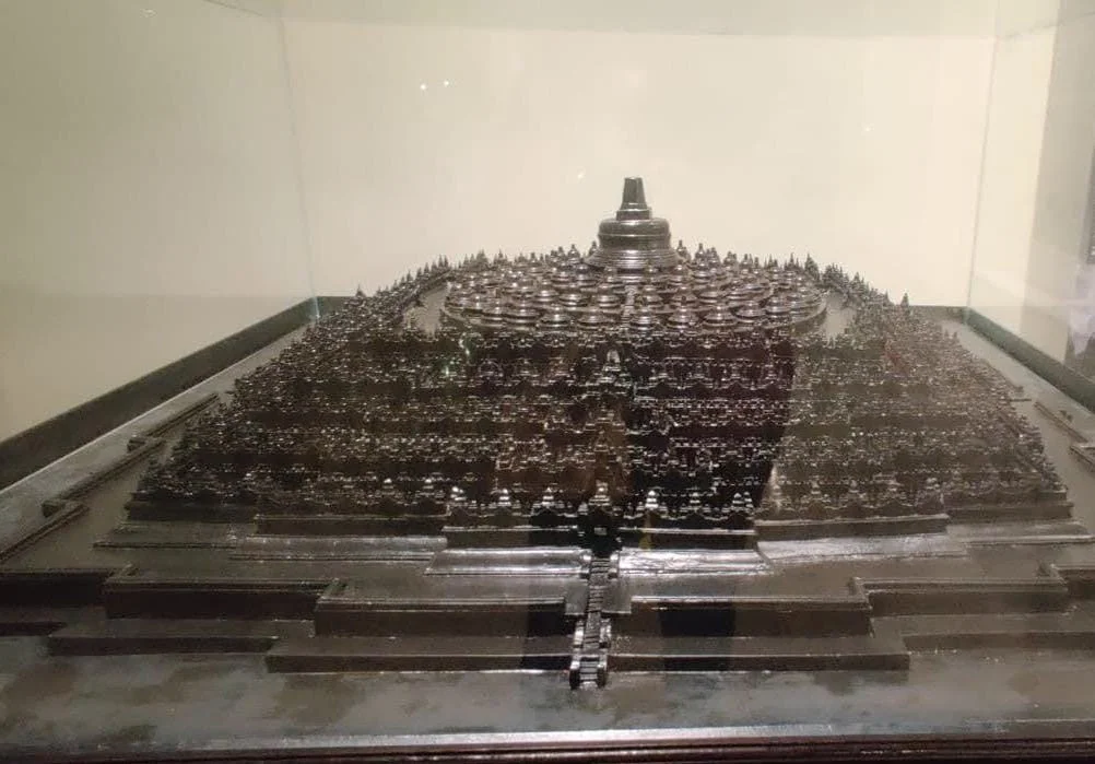 Architectural 3D scale model illustrating the complete cosmic mandala layout, concentric terraces, and central stupa of Borobudur