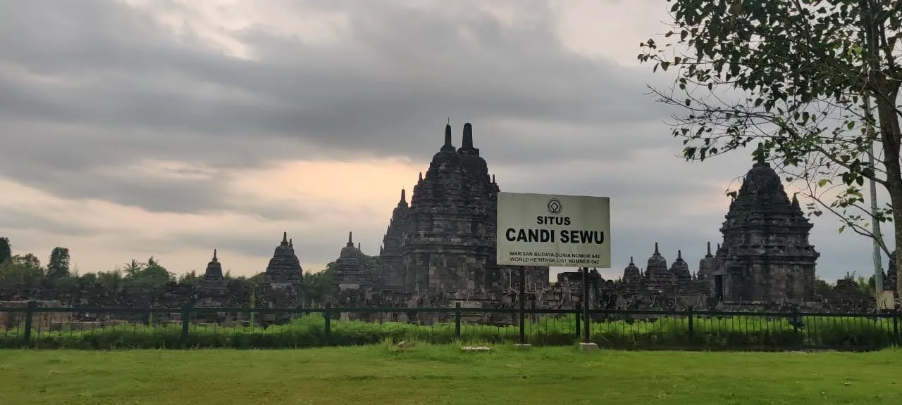 Official Situs Candi Sewu World Heritage site entrance monument with Buddhist temples behind
