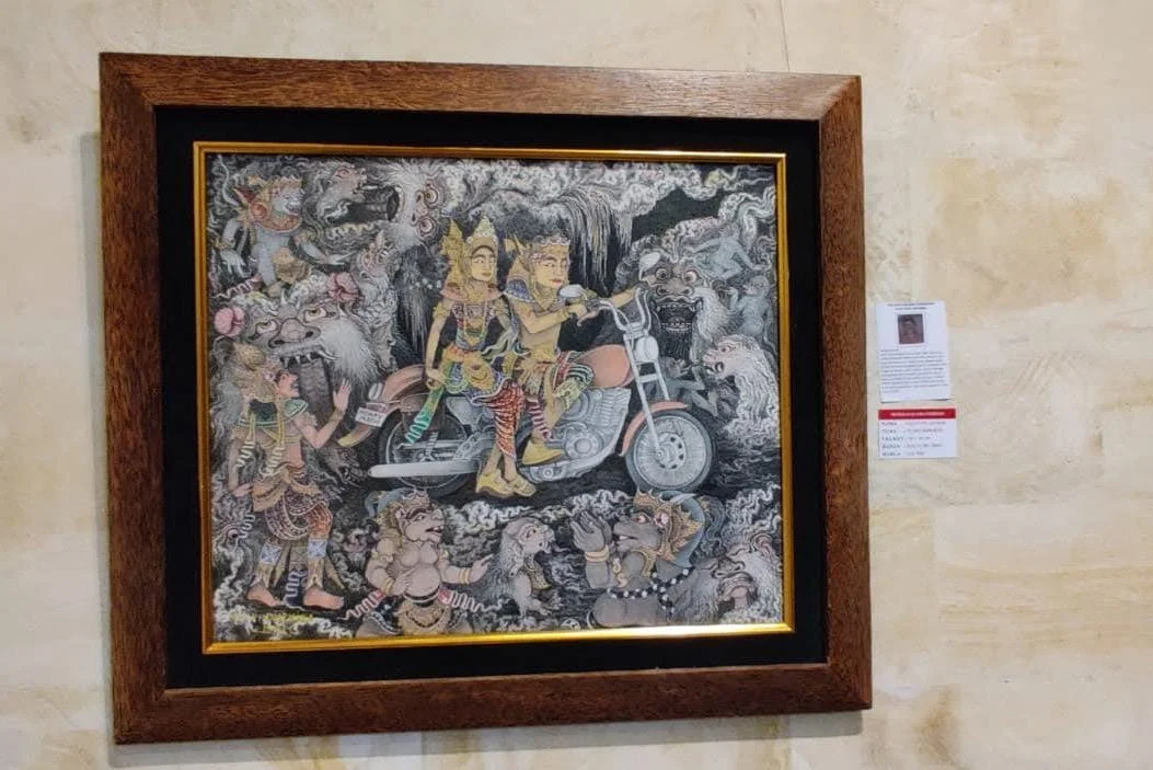 Surreal Balinese painting where traditional mythical deities and demons appear alongside a contemporary motorcycle