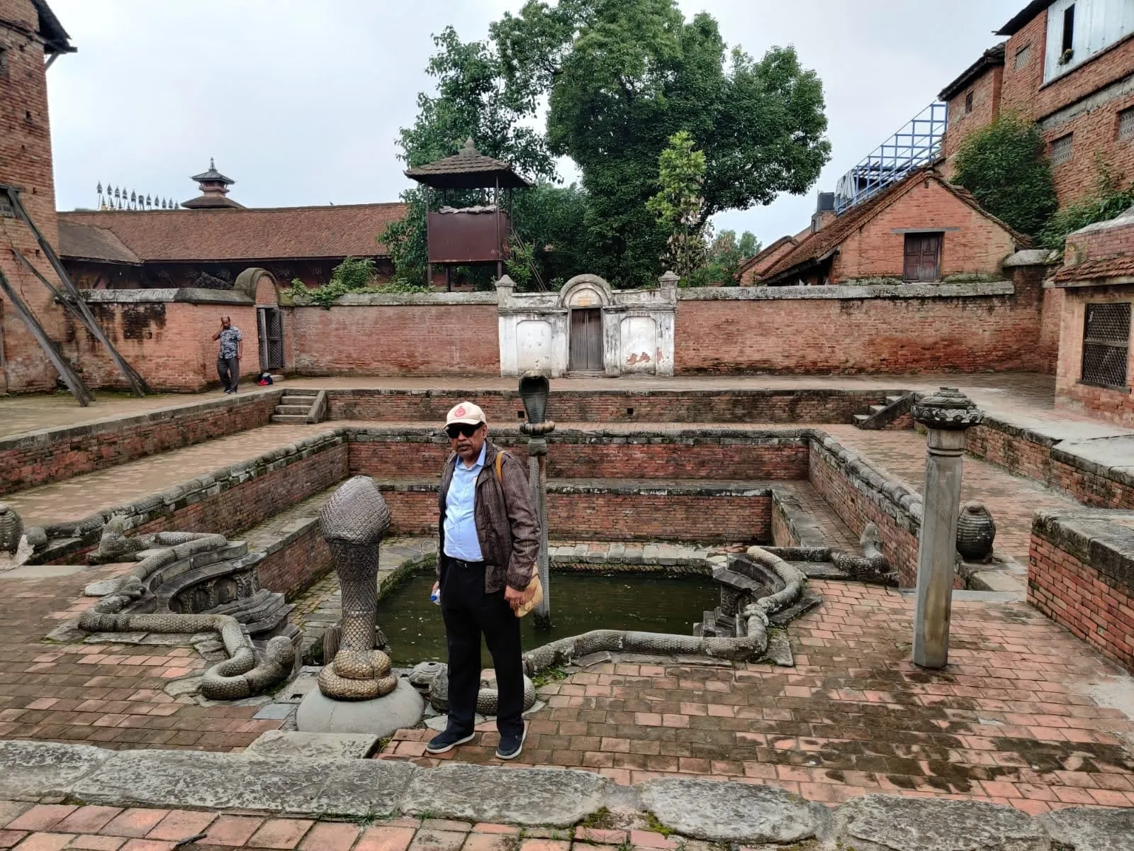 Naga Pokhari royal bathing pool with sacred stone serpent