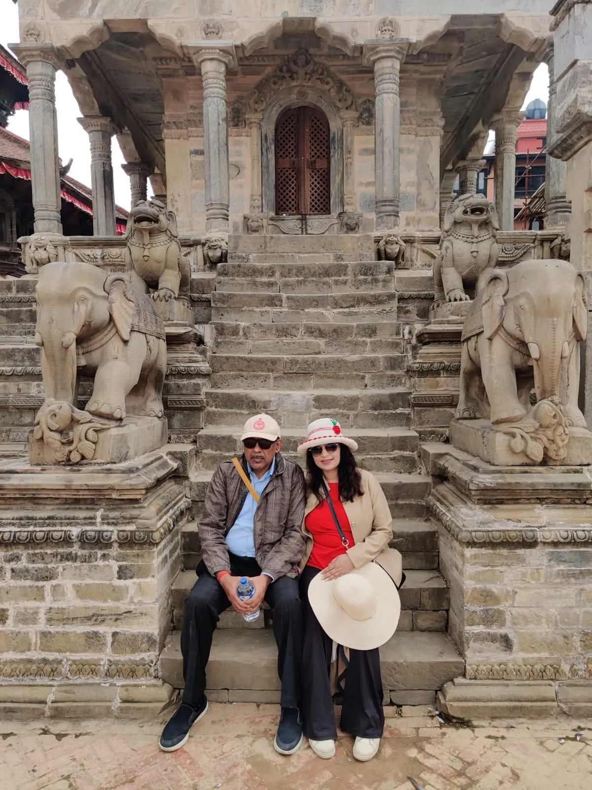 Carved stone war elephants guarding Vatsala Durga Temple steps