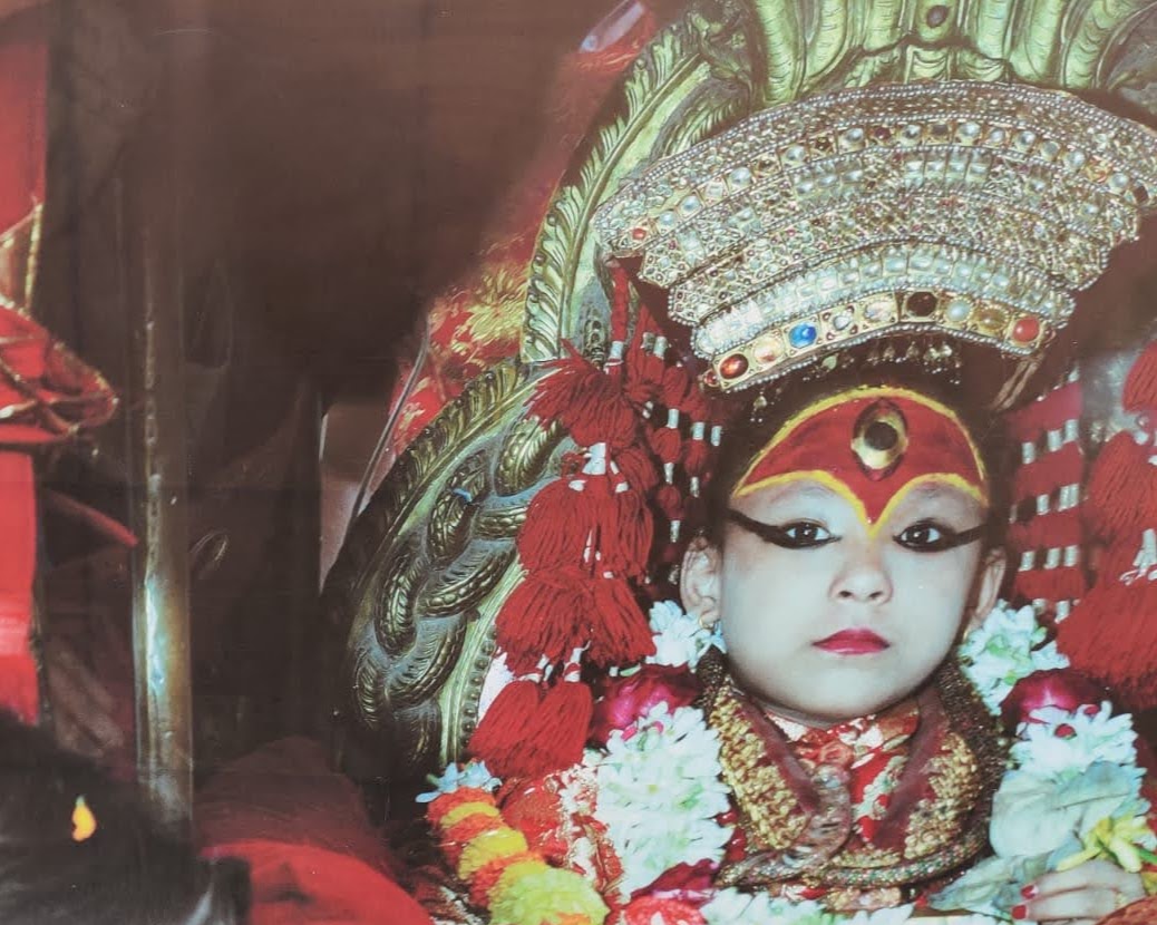 Sacred portrait of the Living Goddess Kumari with ceremonial crown and third eye
