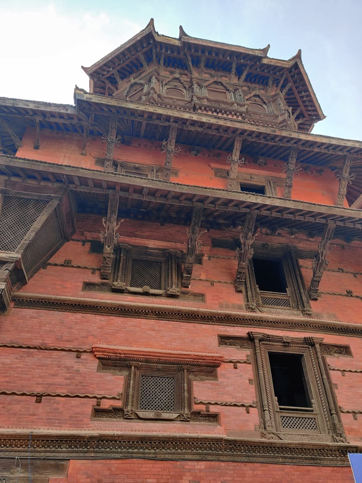 Nautalle Durbar Nine-Storey Palace exterior showing carved wooden windows and tiered tower