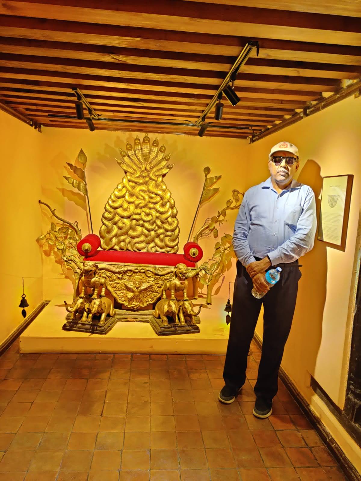 The royal throne of the Patan Kings made of carved wood and gilt copper