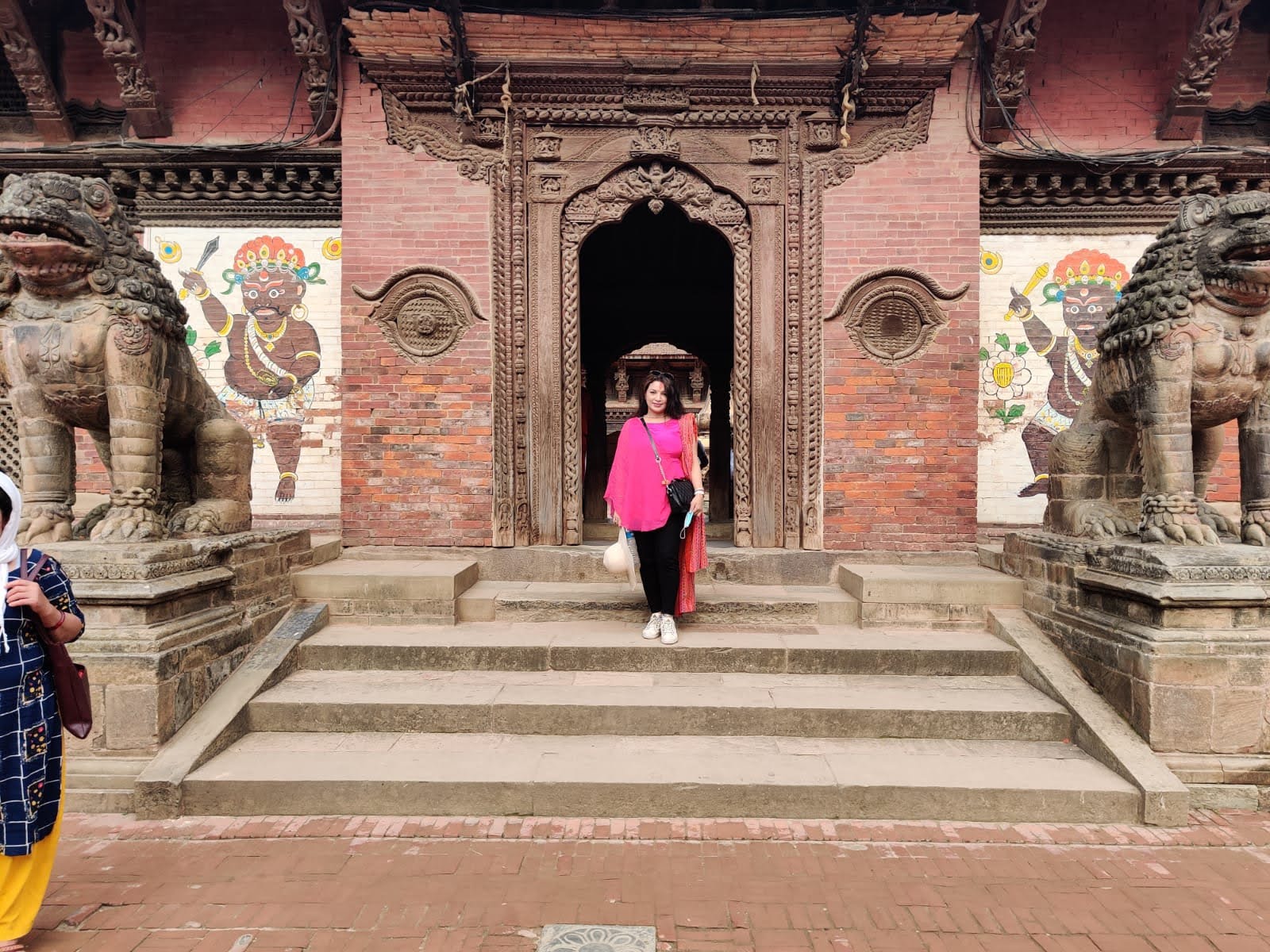 Temple entrance guarded by stone lions