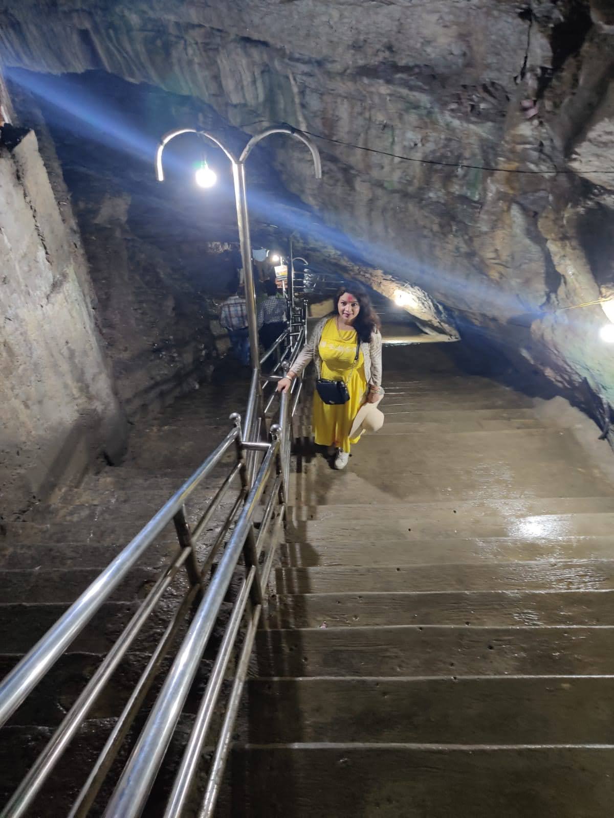 Staircase descending into the deep limestone cavern of Gupteshwor Mahadev
