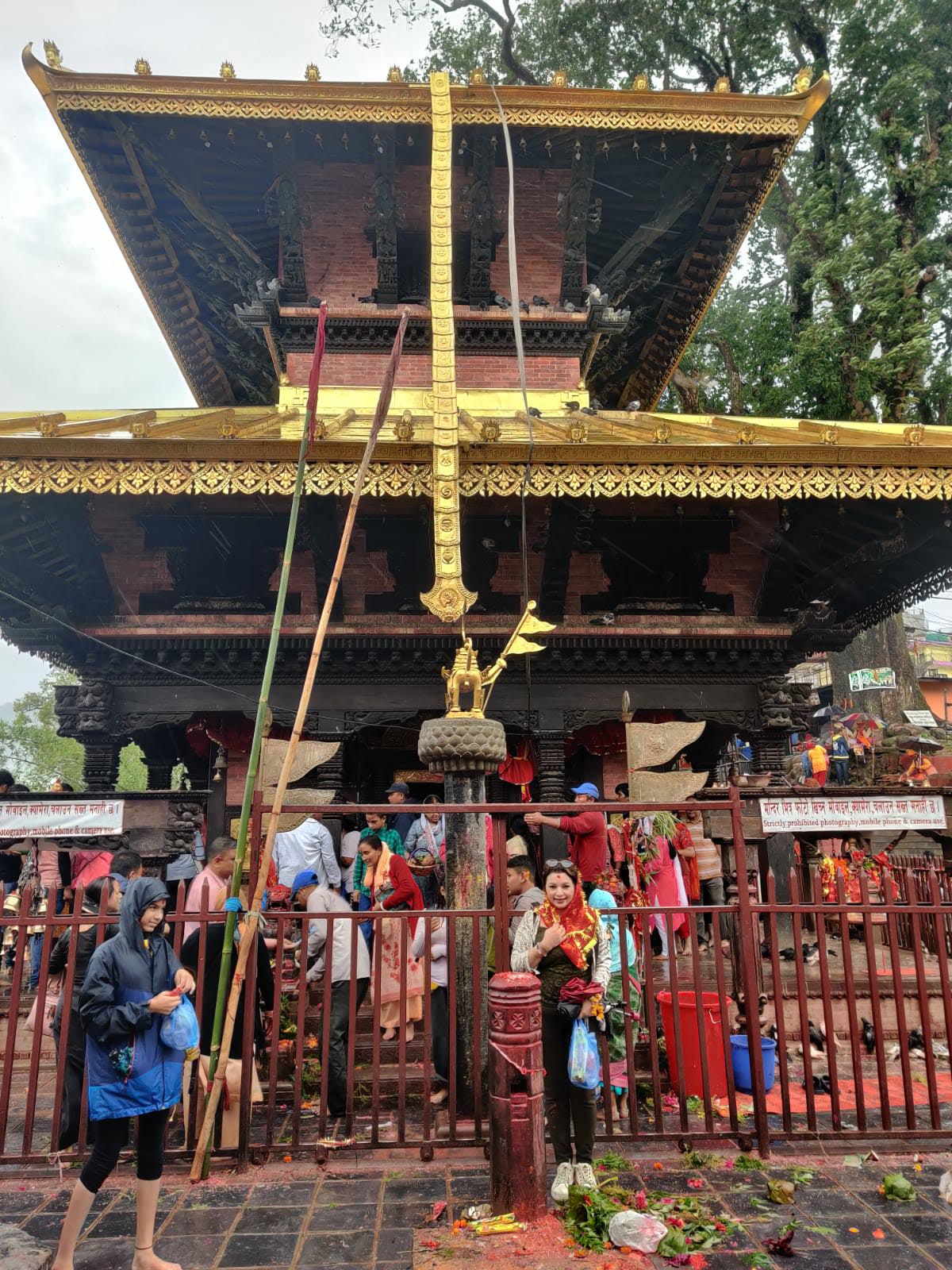 Sacred Manakamana Temple pagoda and devotees in Gorkha District, Nepal
