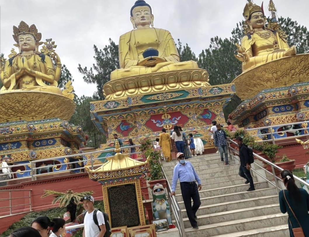 Lord Buddha flanked by Avalokiteshvara and Guru Padmasambhava in the Kathmandu Valley