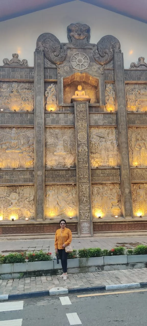 Bronze Buddha statues seated in meditation along the outer deck of Seema Malaka on Beira Lake