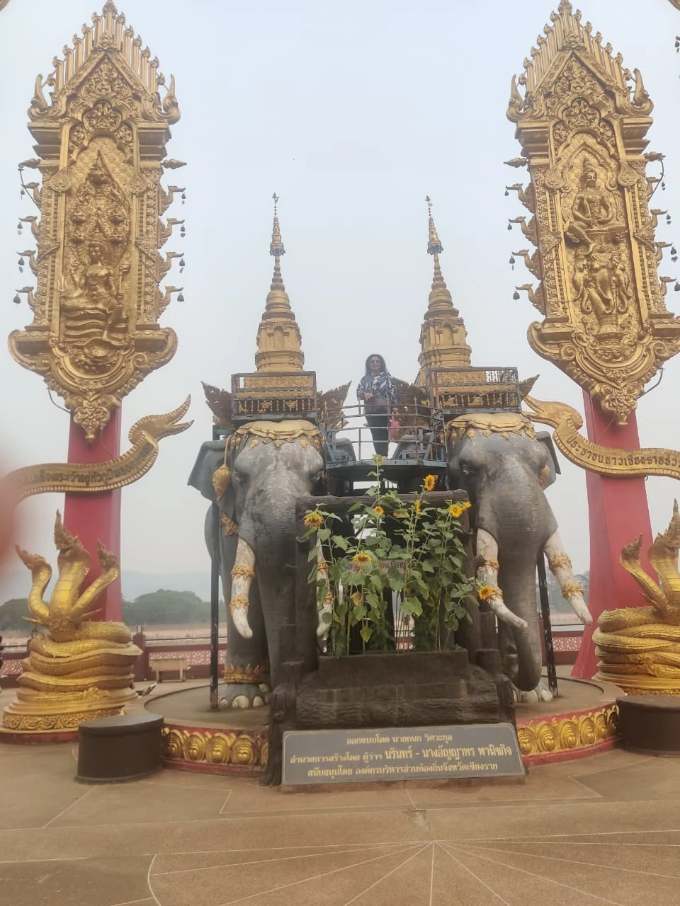 Sacred royal white elephant statues greeting visitors at the Golden Triangle border sanctuary