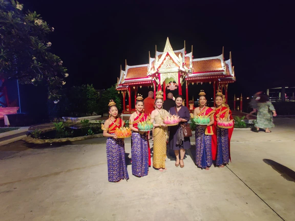 Thai cultural silk dancers celebrating Loy Krathong lantern festival