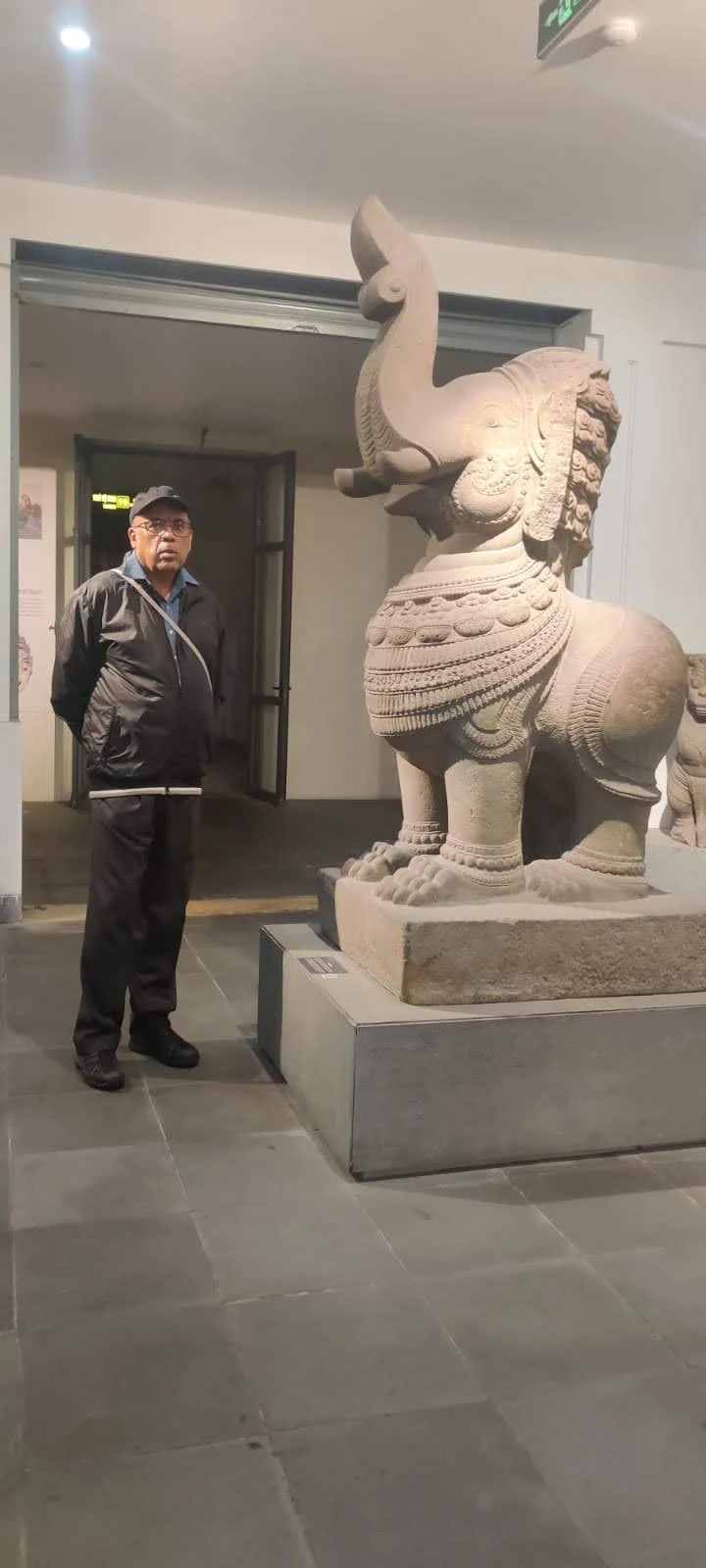 Colossal mythical Cham guardian sculpture in the gallery