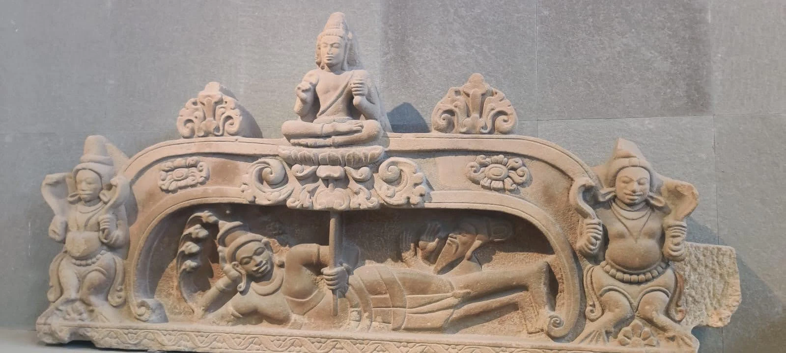 Sandstone pediment of Lord Vishnu reclining on the serpent Sheshanaga
