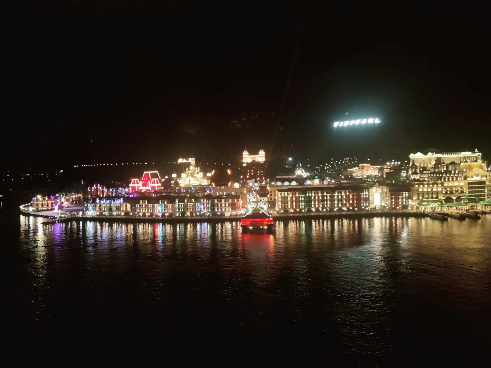 Nha Trang coastline and Hon Tre island panoramic night illumination