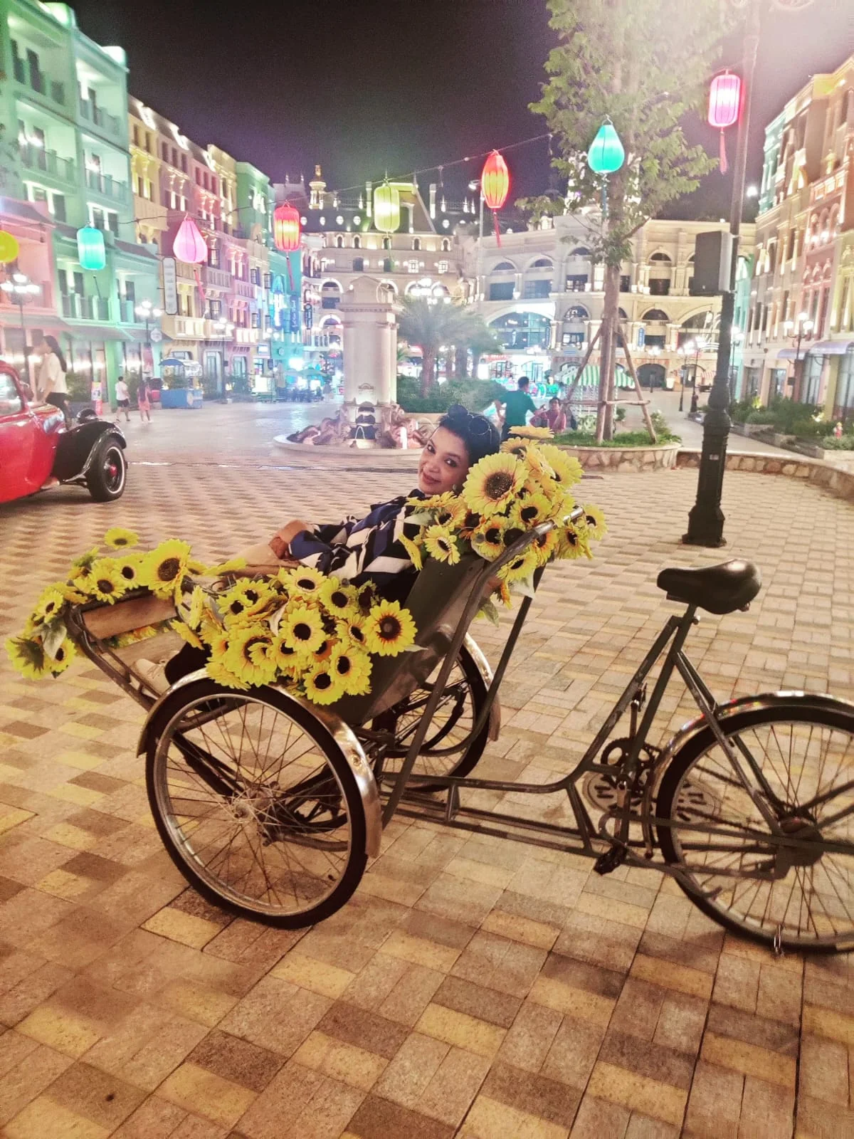 Floral rickshaw along the seaside promenade in Nha Trang