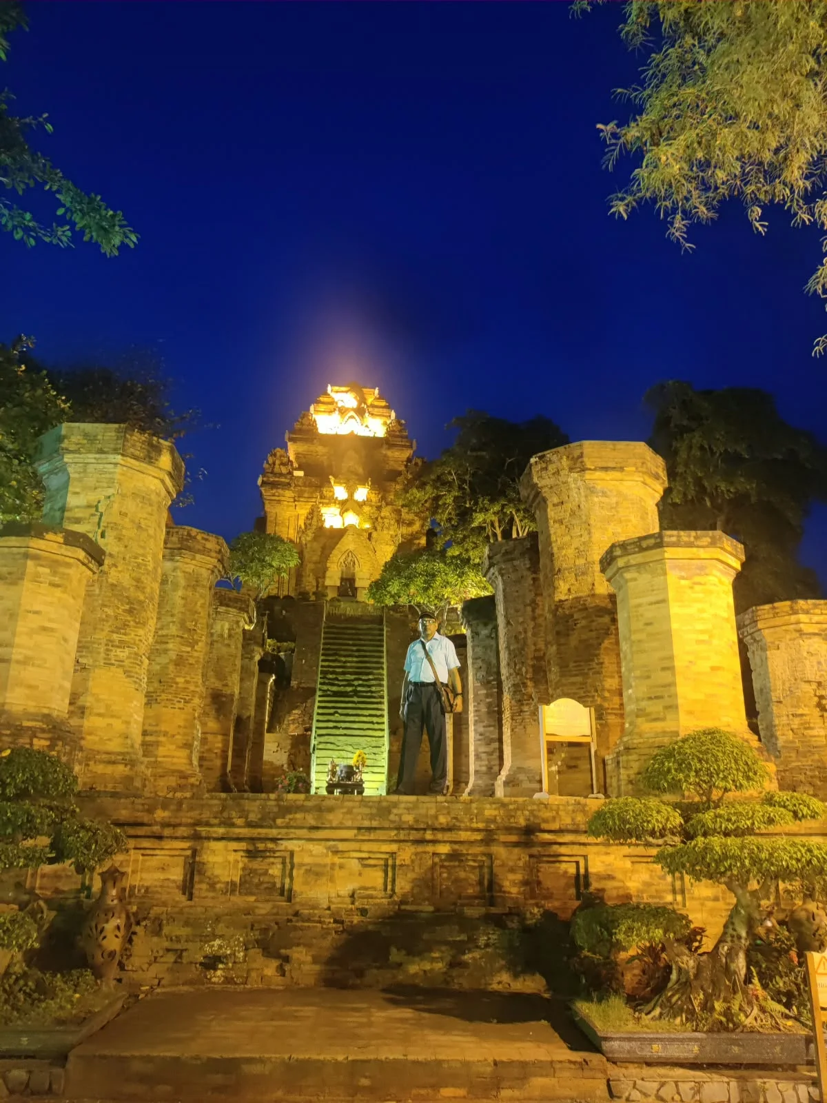 Grand Mandapa brick pillars ascending toward the sacred sanctuary