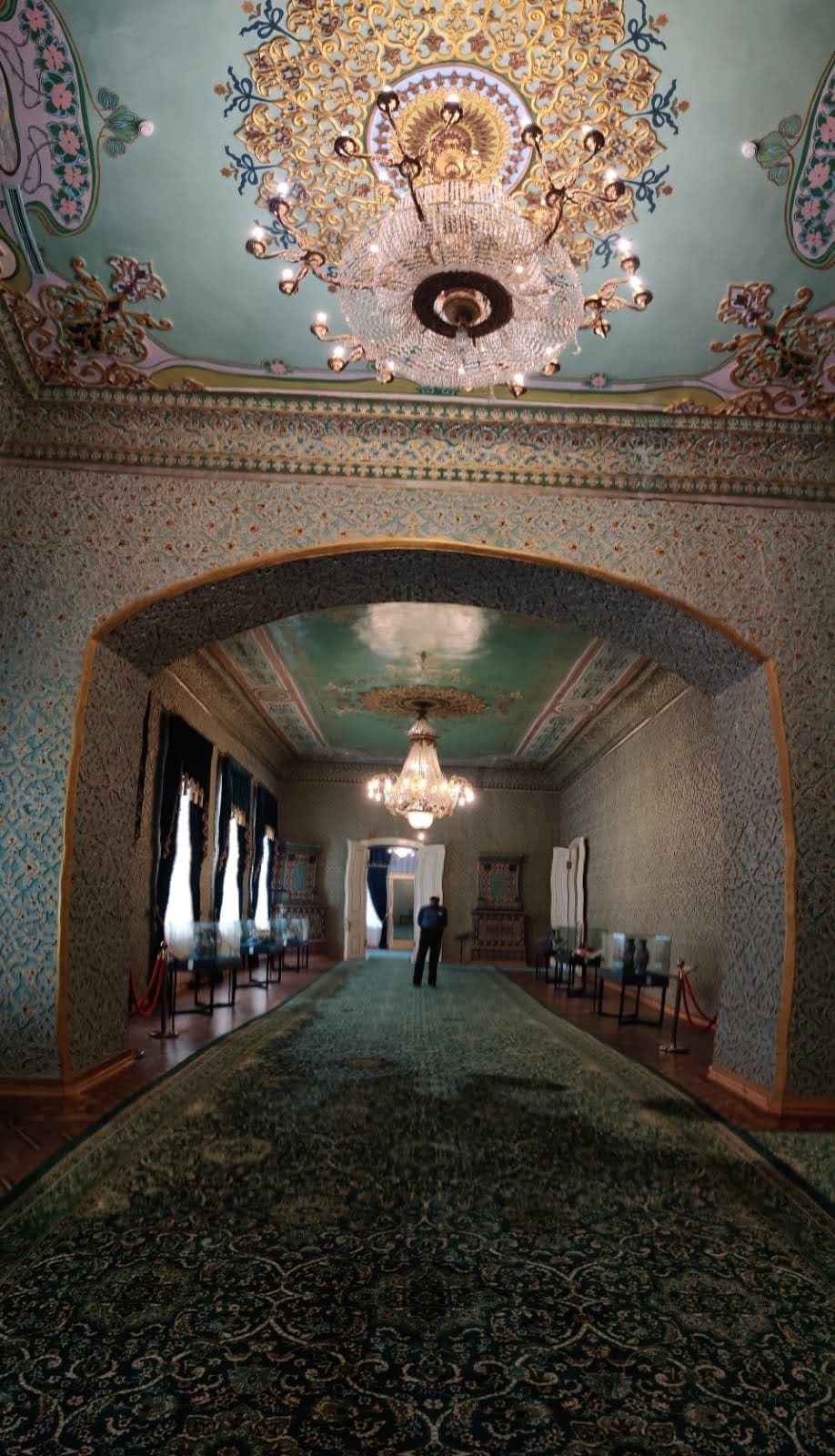 Large decorative palace mirrors and chandeliers