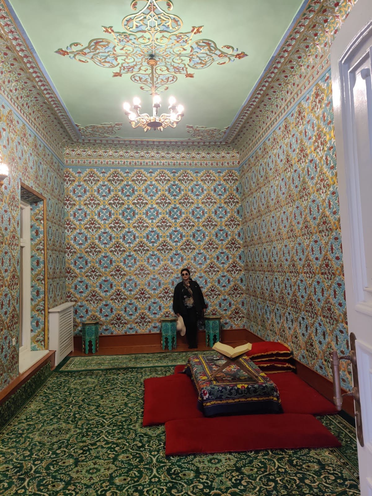 Intricate gilded ceilings in the Nurullaboy Palace rooms