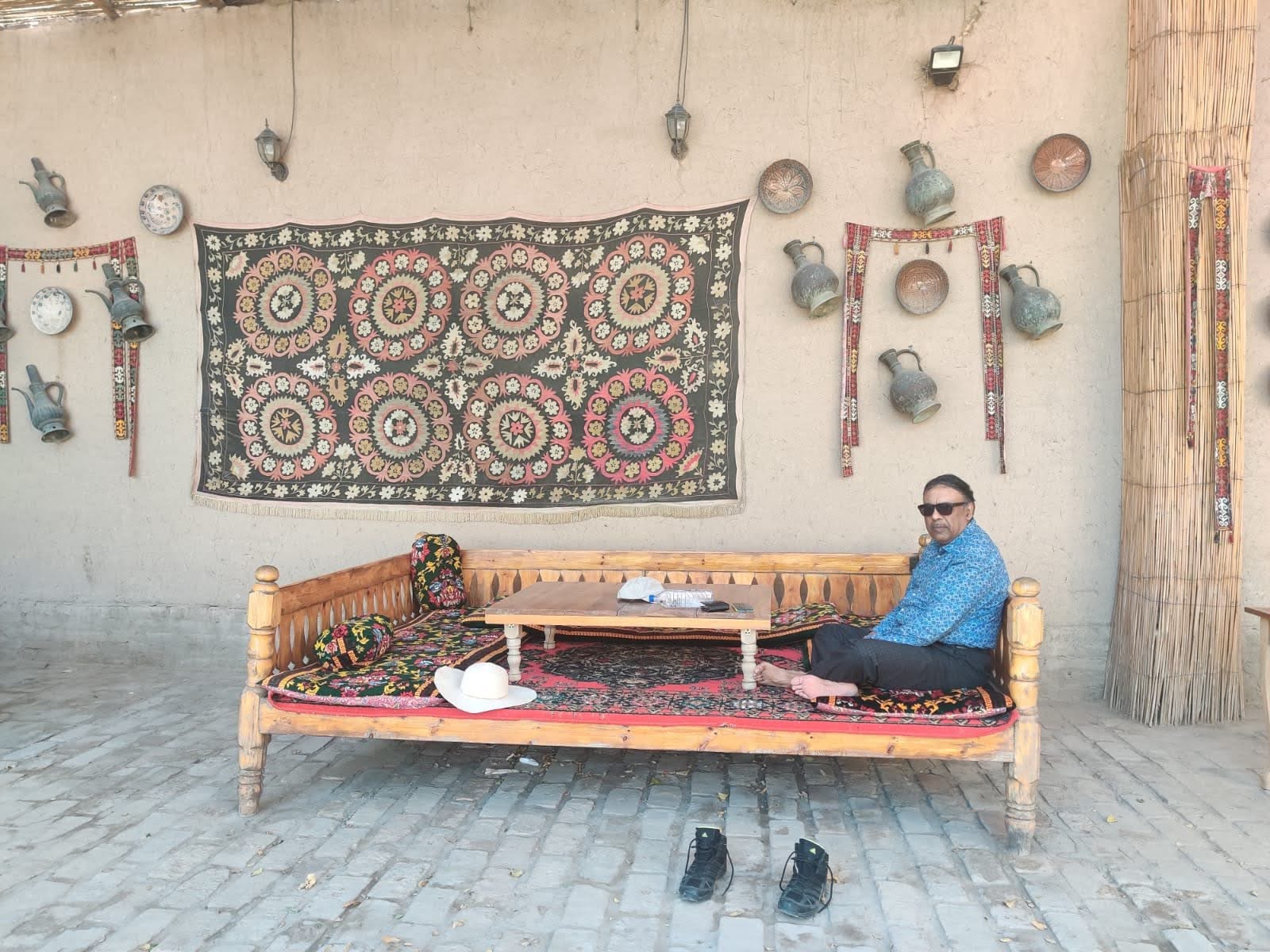 Explorer lunch set up on a traditional wooden Uzbek Tapchan bed