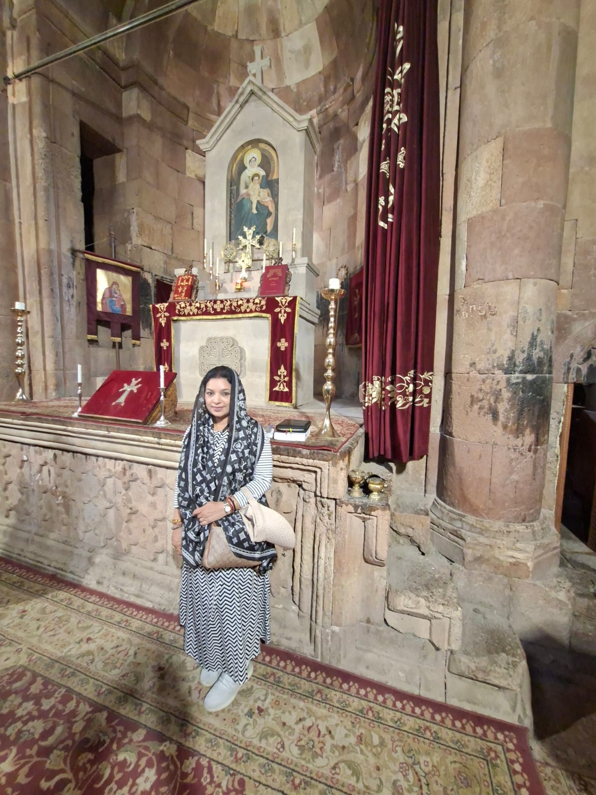 Stone carvings representing religious figures inside Noravank