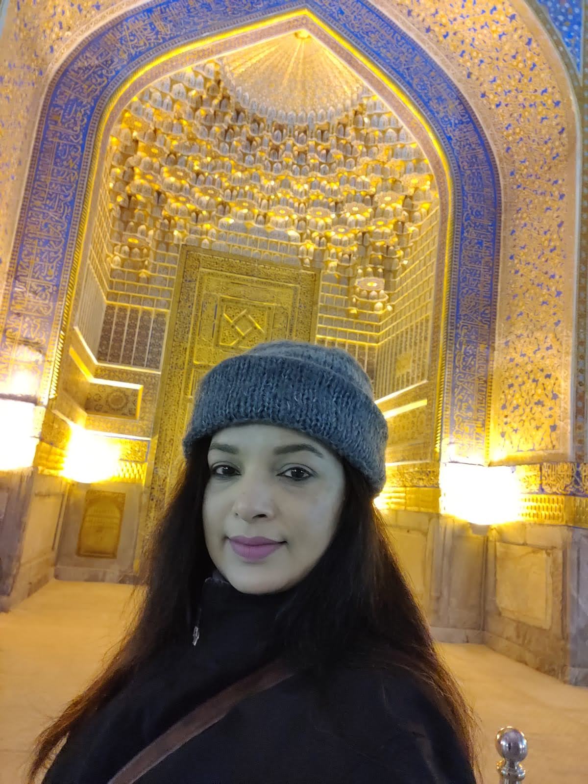 Detail of the golden arched ceilings inside Registan