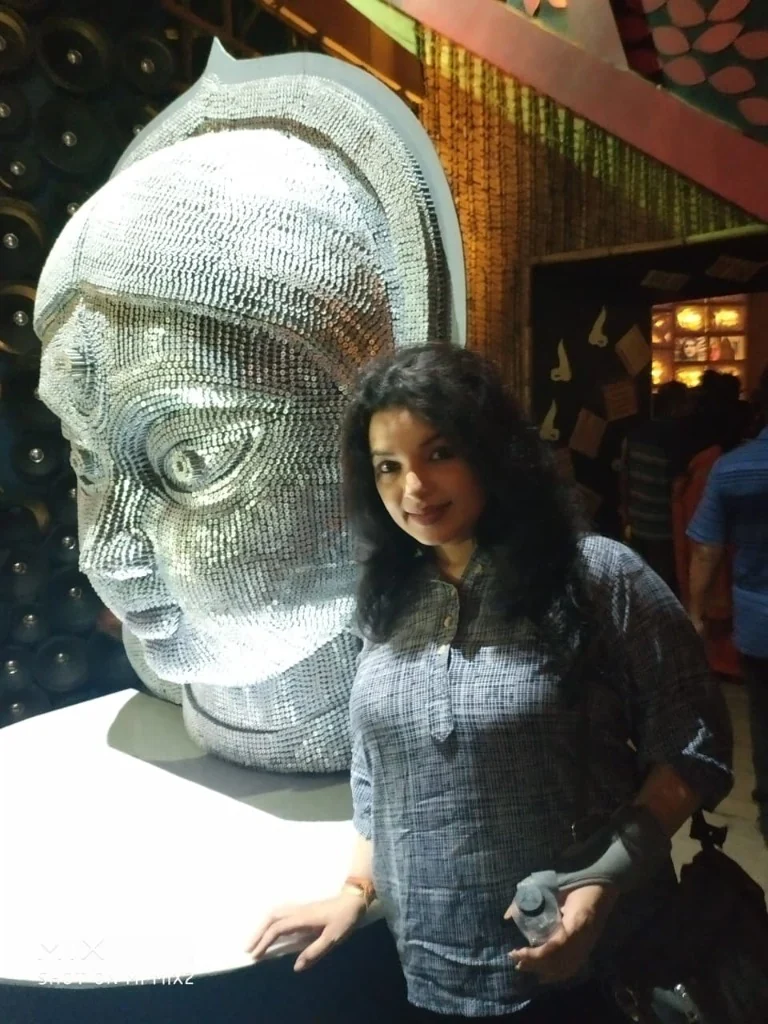 Durga Puja pandal idol for visually impaired visitors tactile metallic sculpture Kolkata