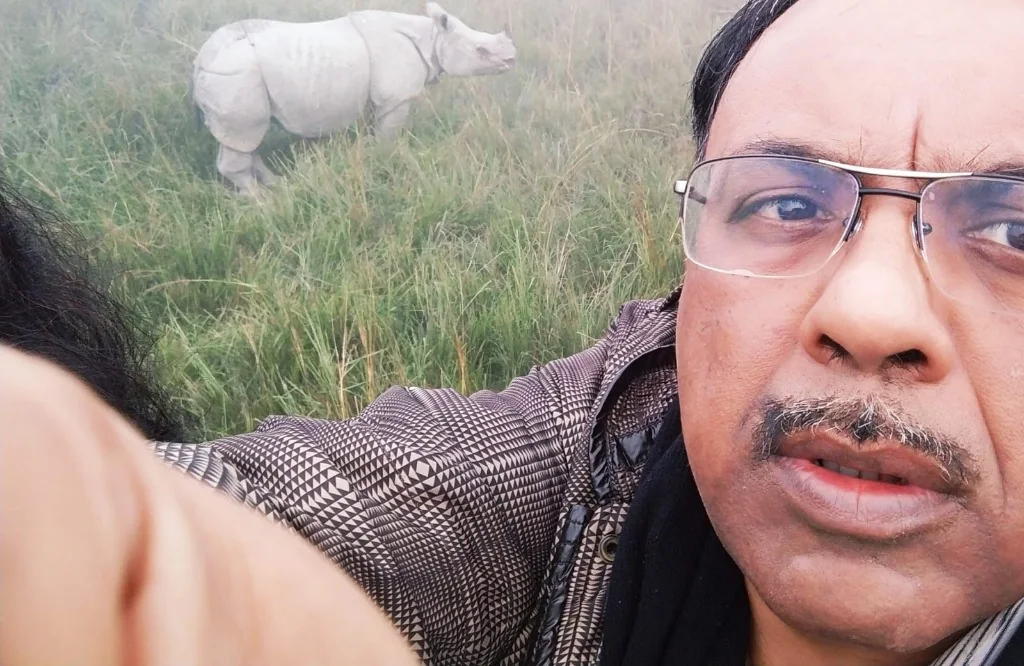 Encounters with one-horned rhinos in the misty grassland