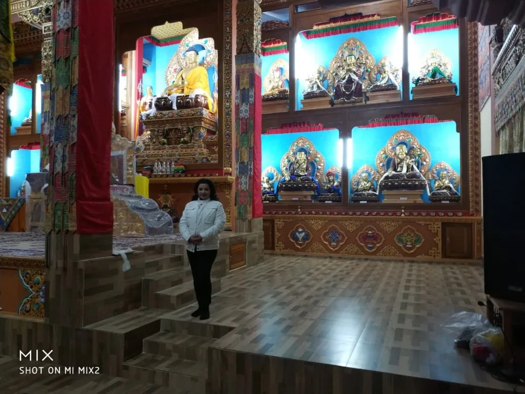 Golden Buddha shrines and statues inside the prayer hall