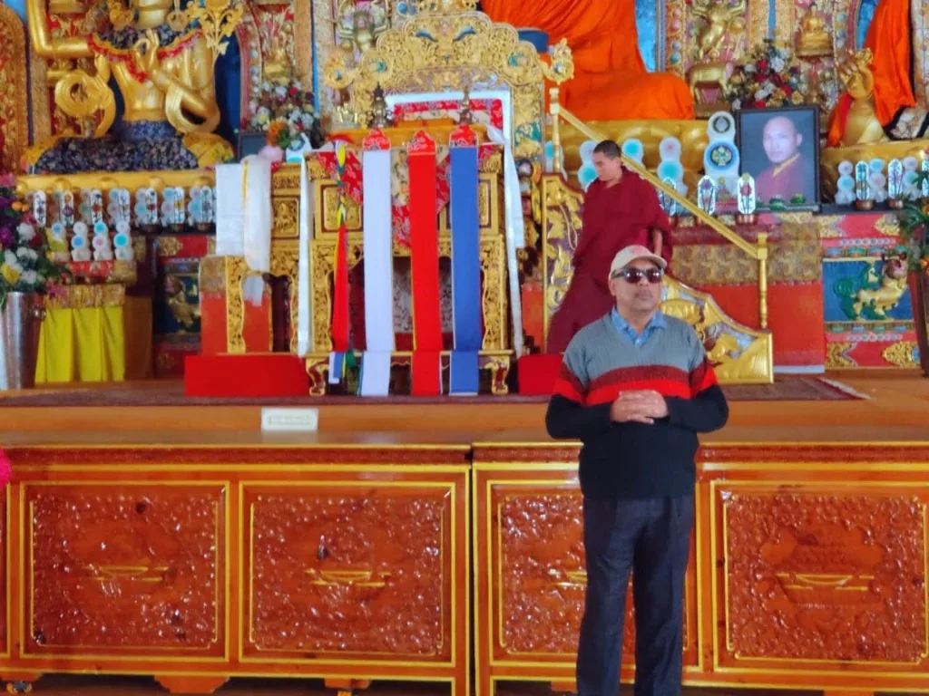 Inside the sacred and colorful prayer hall of Palpung Sherabling Monastery in Palampur