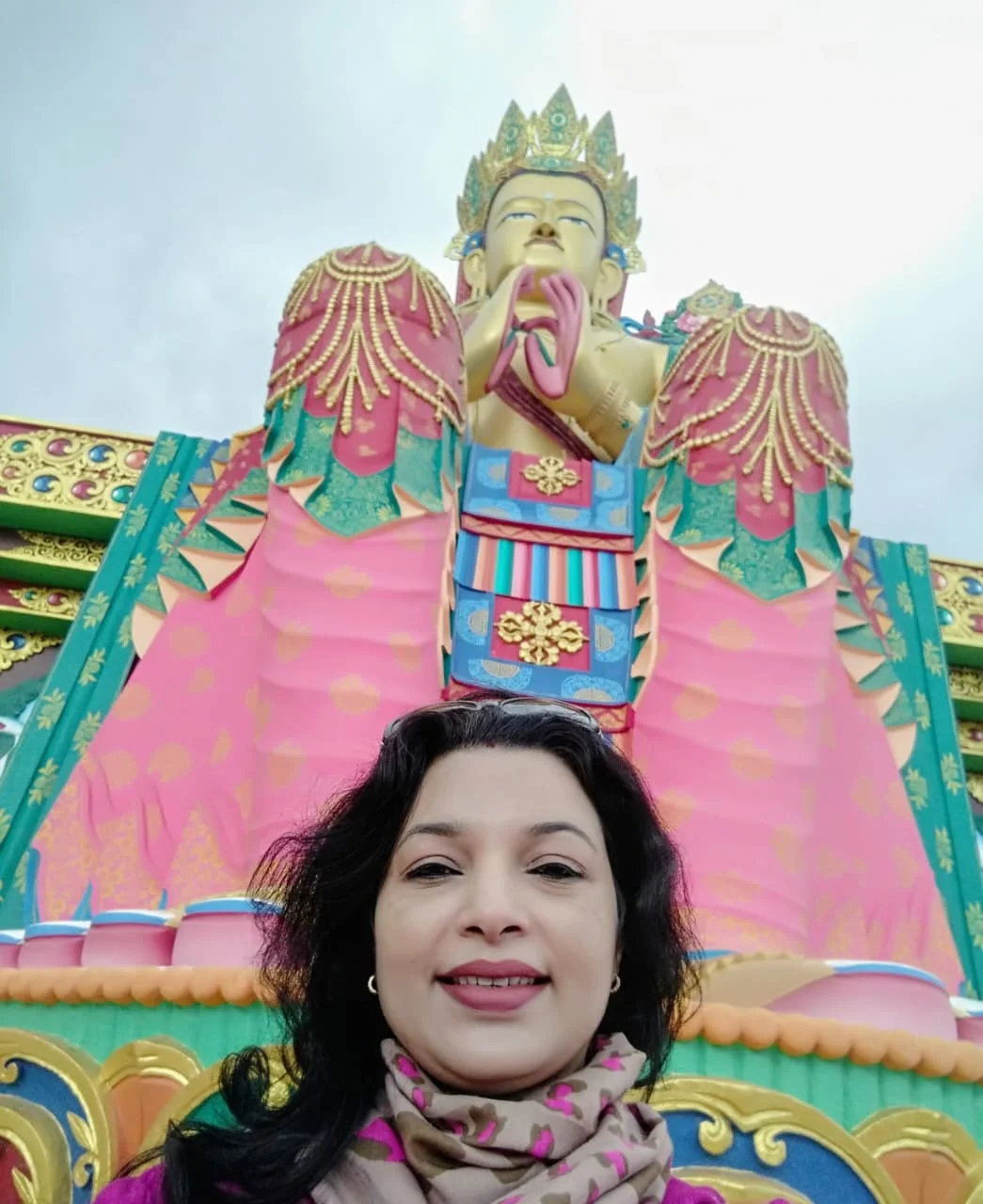 In front of the Maitrey Buddha statue at Diskit Monastery