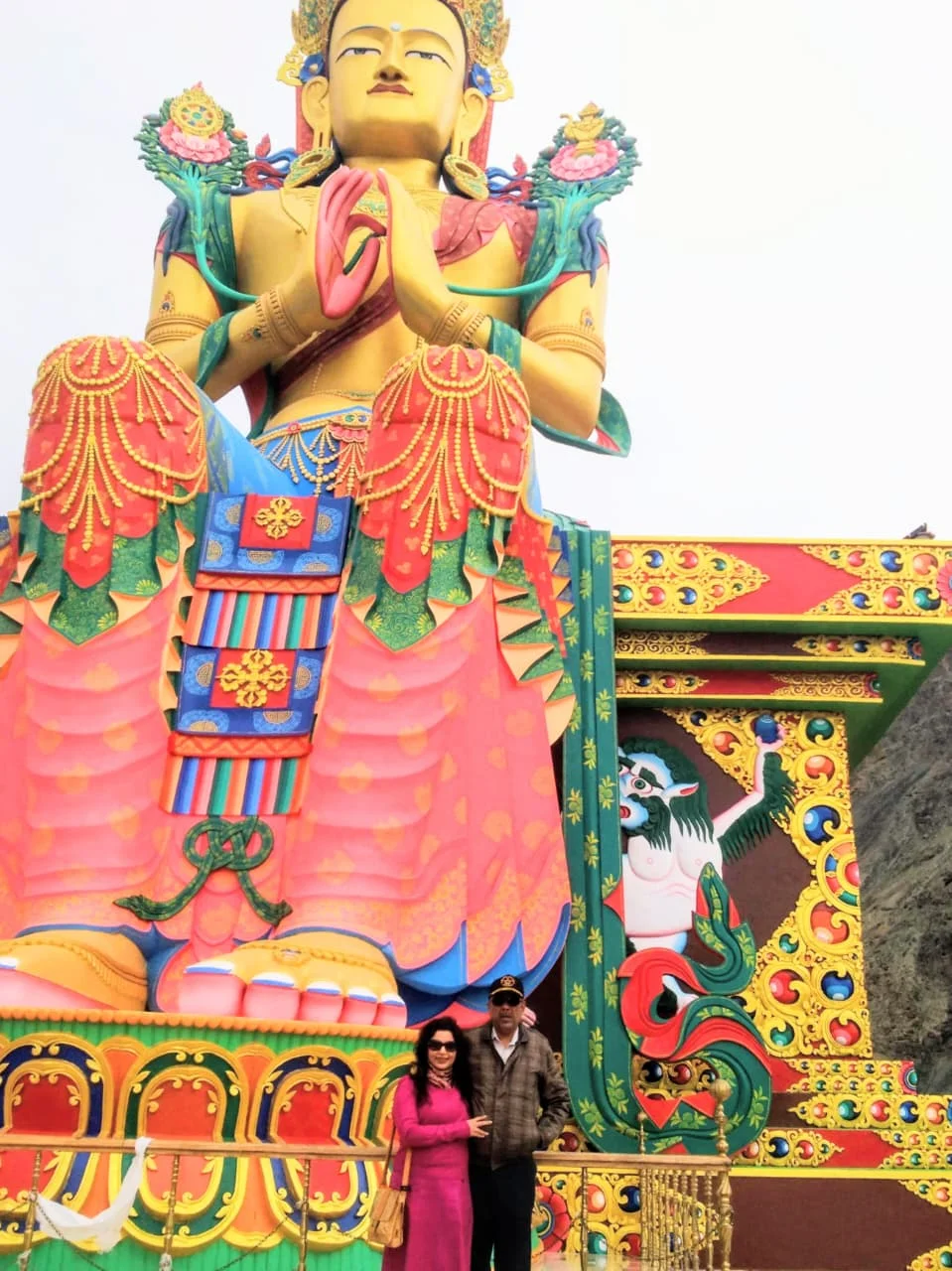 Standing in front of the Maitreya Buddha statue at Diskit Monastery.