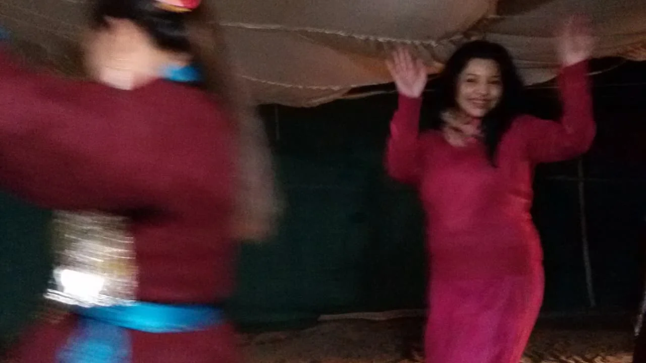 Dancers performing a cultural dance in Hunder.