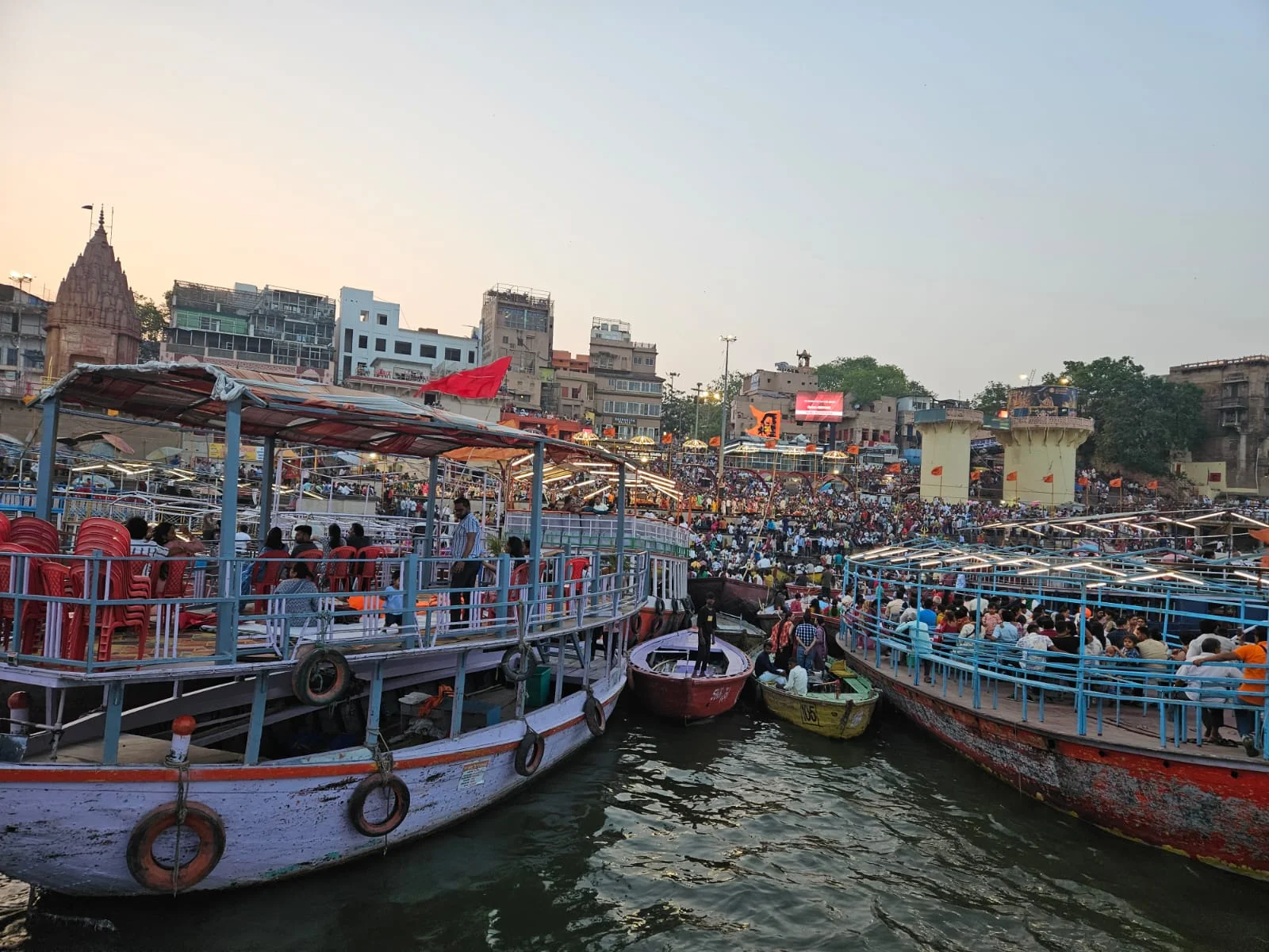 Varanasi temple spires standing proudly against a golden morning sky