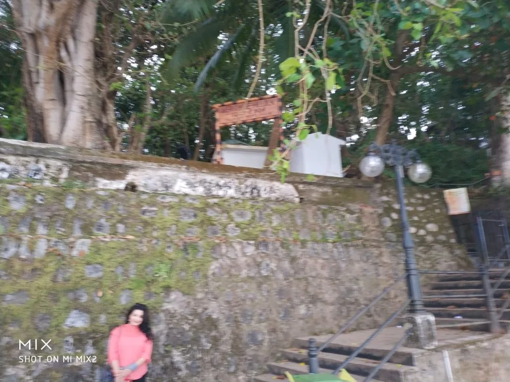 Historic stone wall and steps of Thalassery Fort along Mahé heritage walk