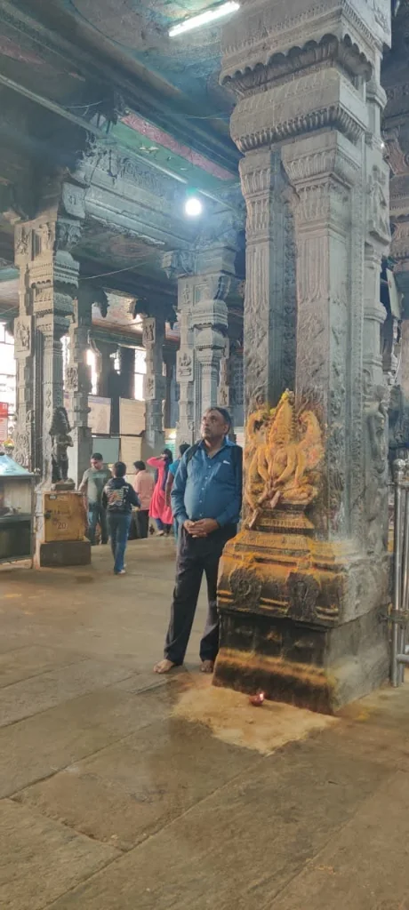 Historically carved stone pillar inside Meenakshi Temple mandapam