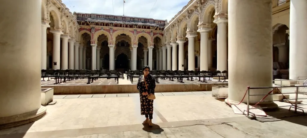 Vast central courtyard of Thirumalai Nayakkar Mahal surrounded by white pillars
