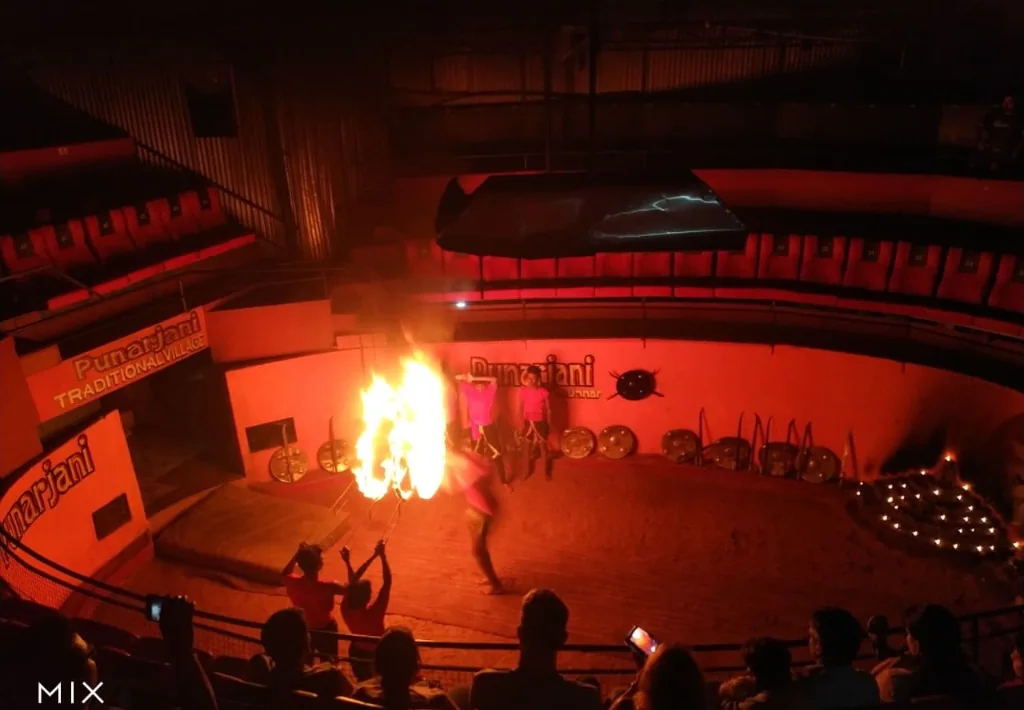 Daring fire performance at Punarjani Traditional Village arena