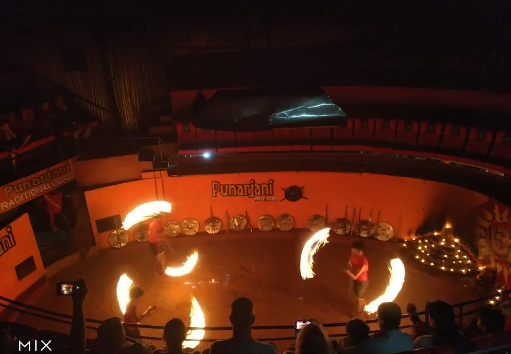 Fire spinning acrobatics demonstration in Kalaripayattu